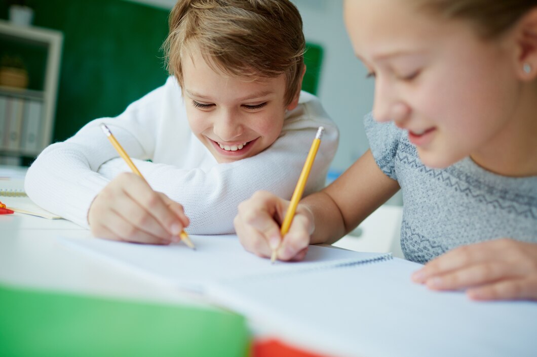 classmates-writing-same-notebook_1098-2264.jpg