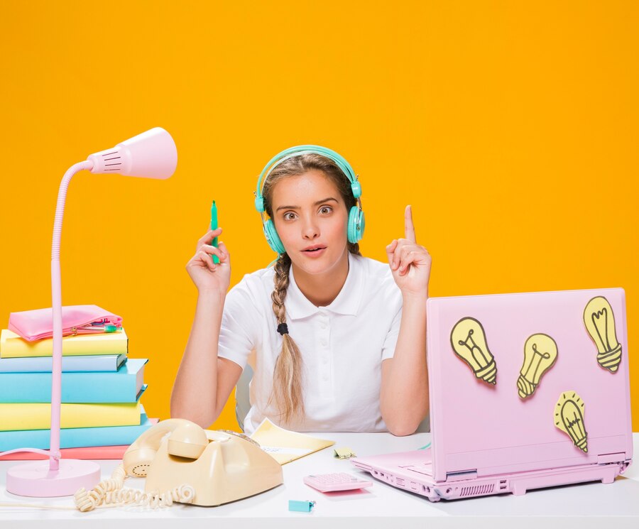 schoolgirl-desk-with-laptop-memphis-style_23-2148203784.jpg